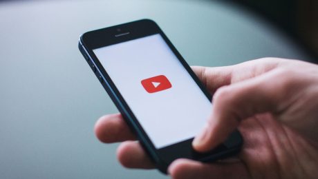 Closeup on phone with YouTube playing