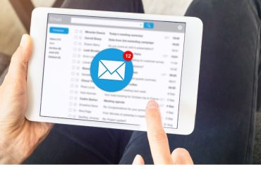 Person opening their email on a tablet