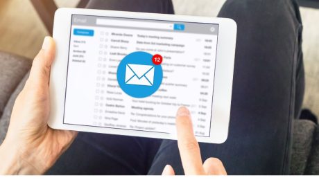 Person opening their email on a tablet